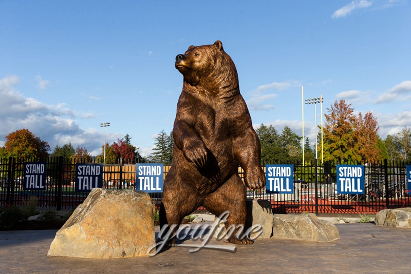 bronze grizzly bear statue in school