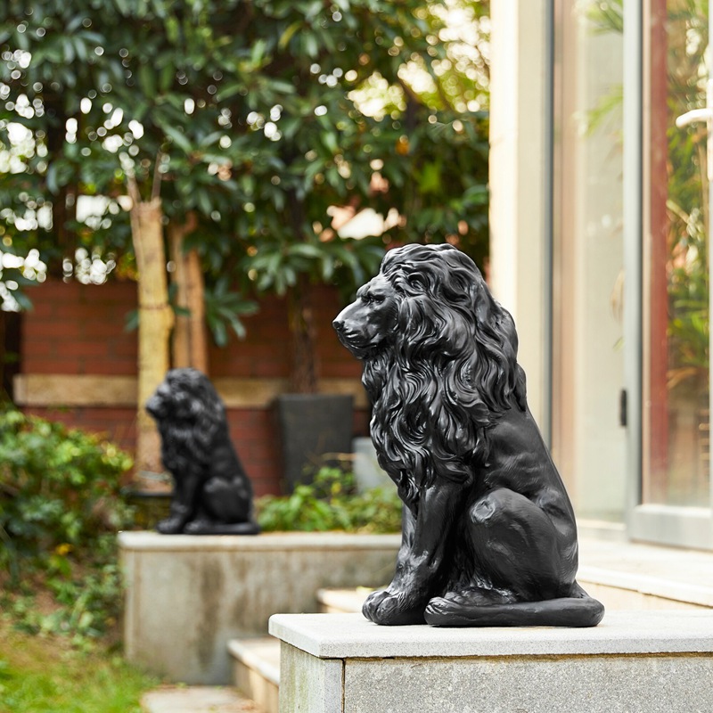 bronze lion statues in front door