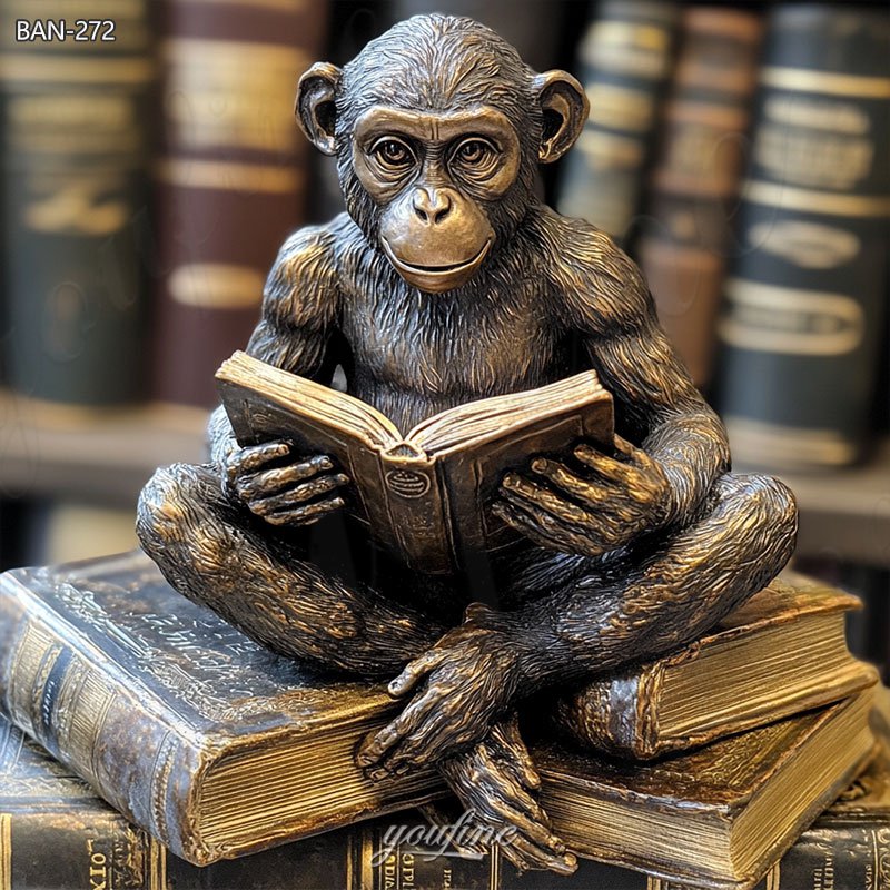 bronze monkey reading book statue