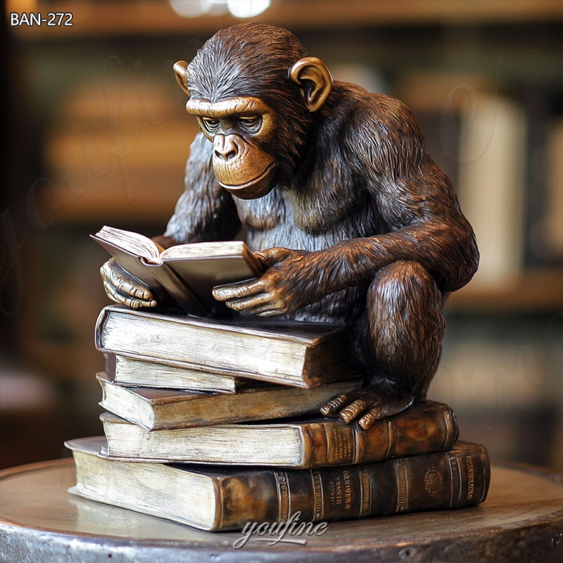 monkey reading a book statue