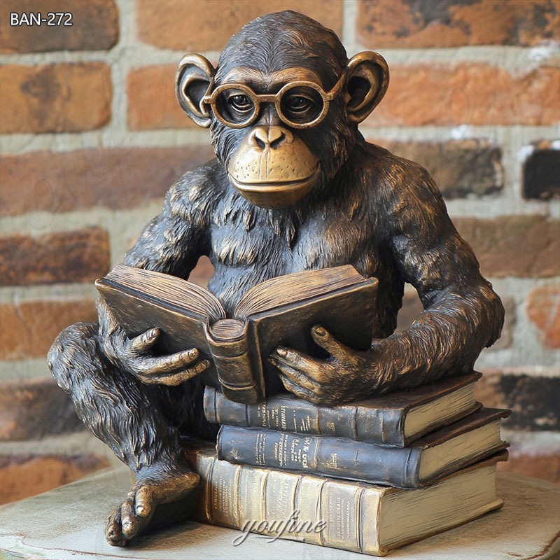 monkey reading book with glasses