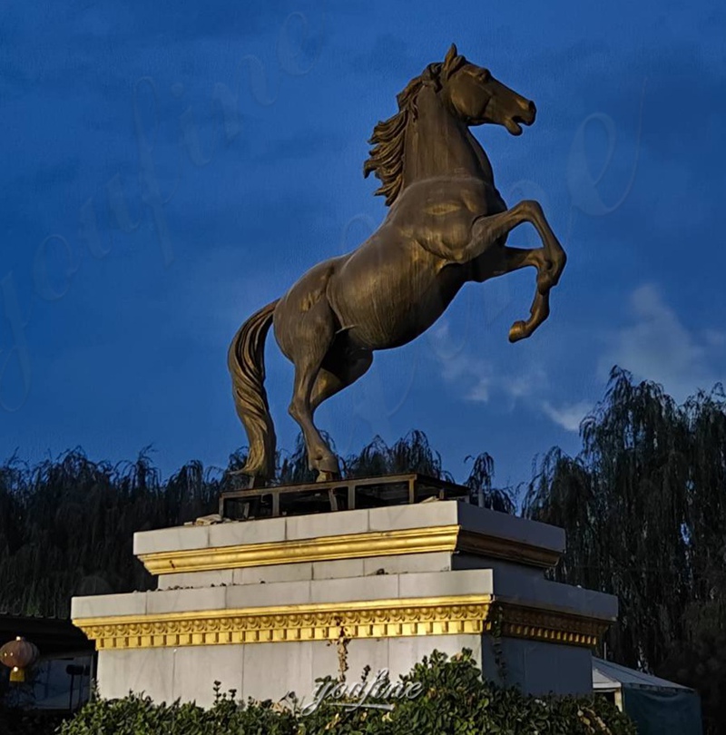 bronze rearing horse in square