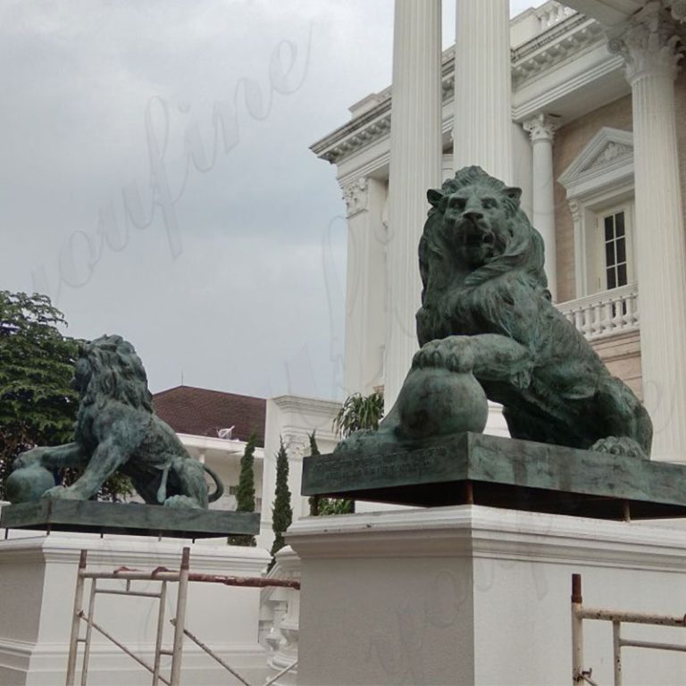 bronze-lion-statue-in-front-of-house