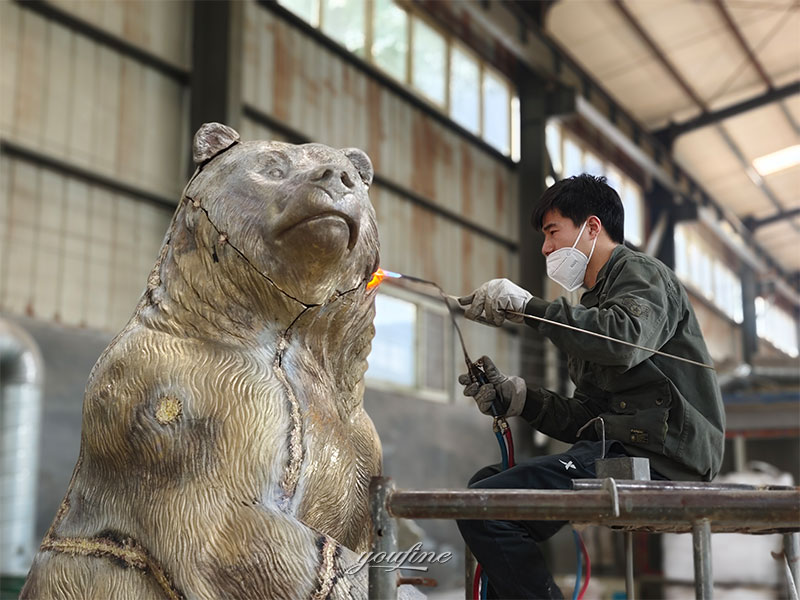 bronze grizzly statue welding