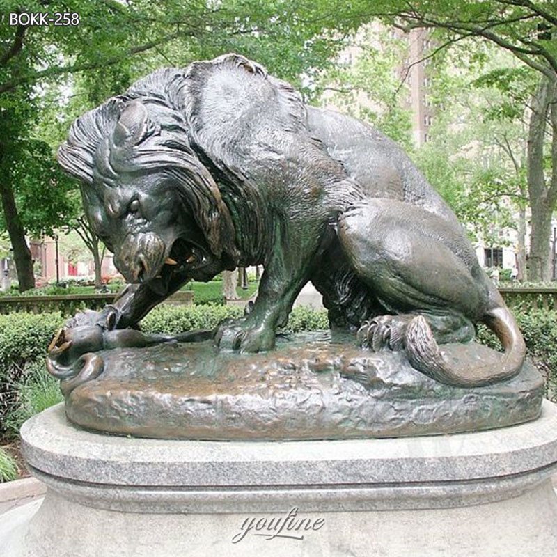 bronze lion and serpent sculpture