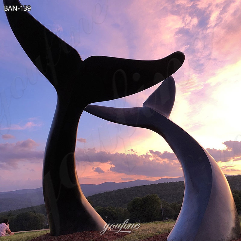 bronze whale tail sculpture