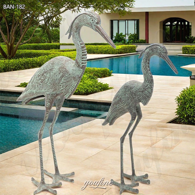 large metal heron statue