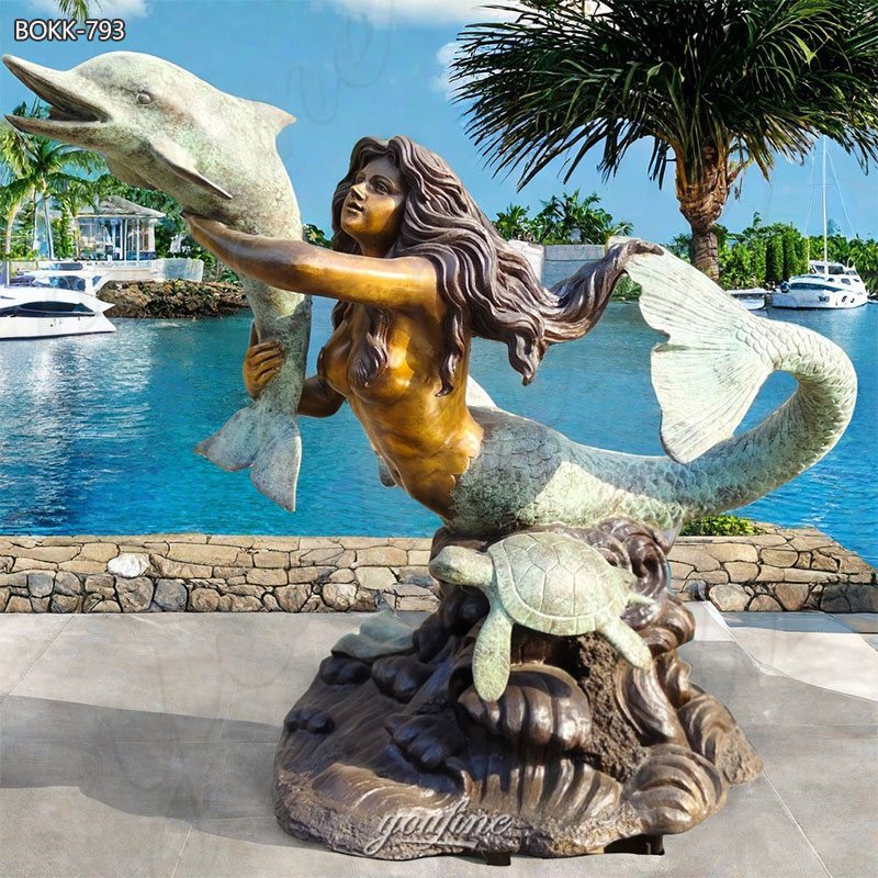 mermaid and dolphin statue