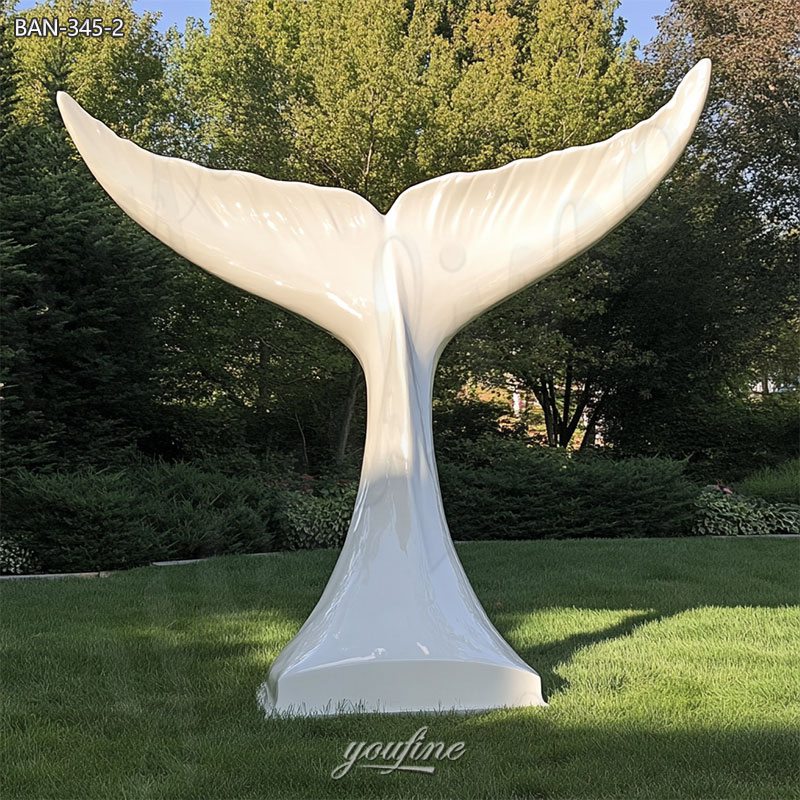 white whale tail statue